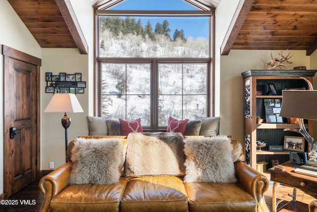 living room with wood ceiling and lofted ceiling with beams