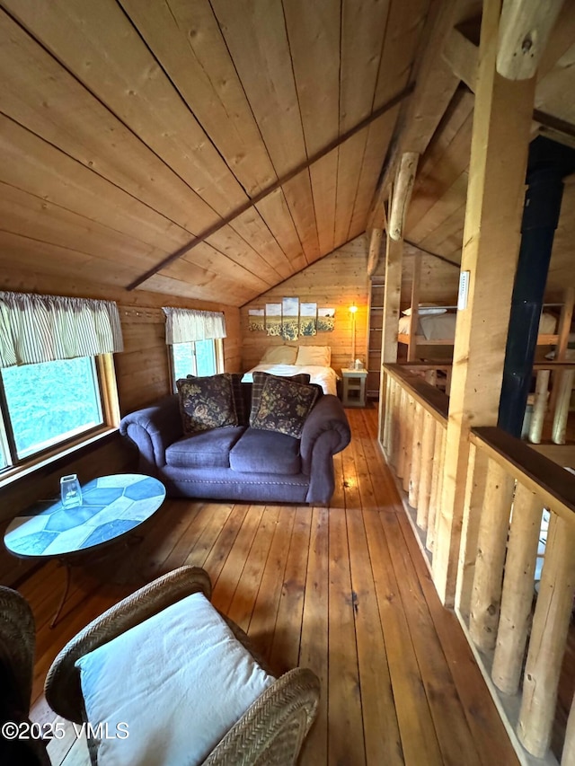 1234 6th St, Eagle, CO 81631 - living area with wooden ceiling, wooden walls, lofted ceiling, and hardwood / wood-style flooring