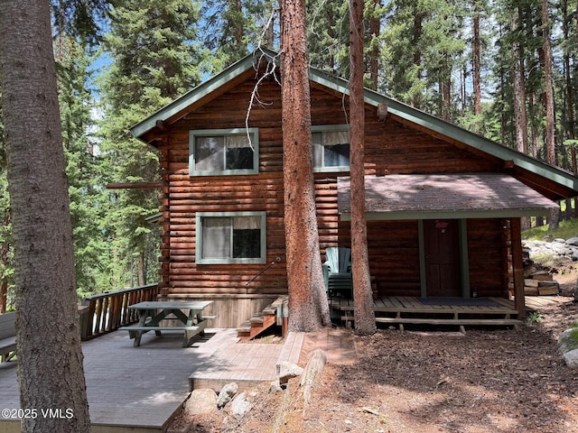 1234 6th St, Eagle, CO 81631 - back of house with log siding and a deck