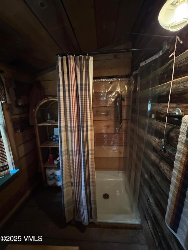1234 6th St, Eagle, CO 81631 - full bath with wood walls, a stall shower, and wood ceiling