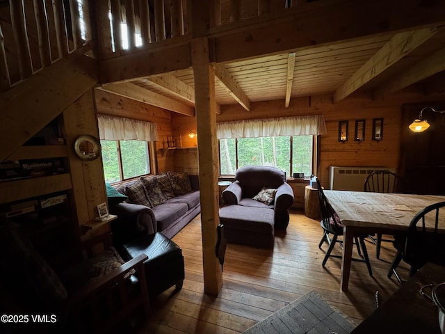 1234 6th St, Eagle, CO 81631 - living room with hardwood / wood-style flooring, wood walls, and a wooden ceiling with exposed beams