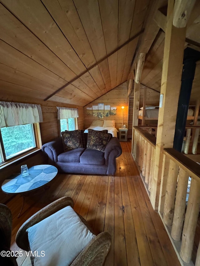 1234 6th St, Eagle, CO 81631 - living area with wooden walls, wood ceiling, vaulted ceiling, and hardwood / wood-style flooring