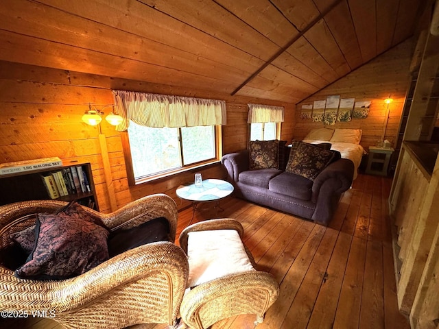 1234 6th St, Eagle, CO 81631 - living area featuring vaulted ceiling, wooden walls, hardwood / wood-style flooring, and wood ceiling