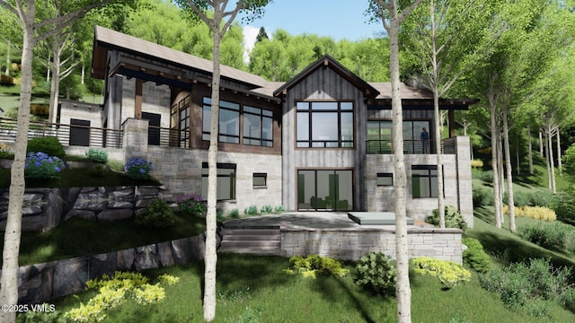 880 Forest Trl, Edwards, CO 81632 - rear view of house featuring stone siding, a patio area, and a balcony
