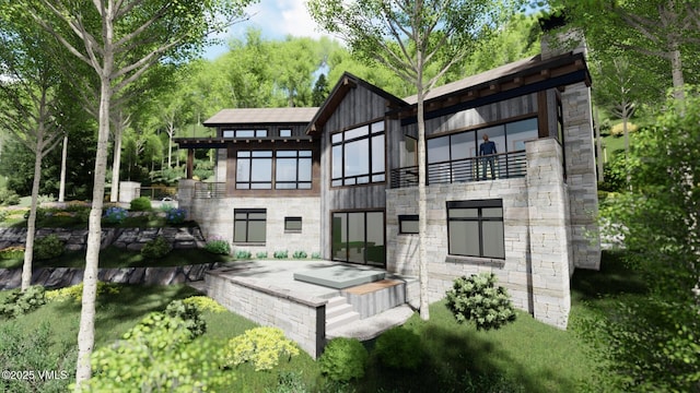 back of house featuring a balcony and stone siding