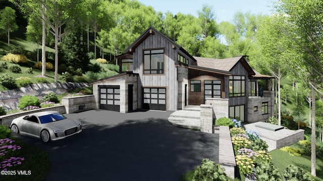 view of front of home with aphalt driveway, stone siding, and a garage