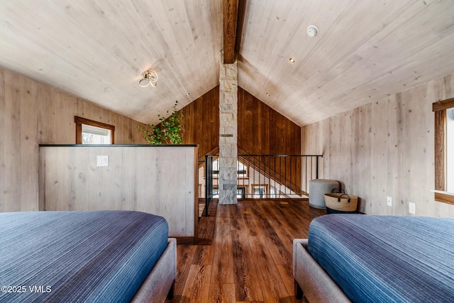 329 River Frontage Rd Unit 18, Silt, CO 81652 - bedroom featuring wood ceiling, wood walls, lofted ceiling with beams, and wood finished floors