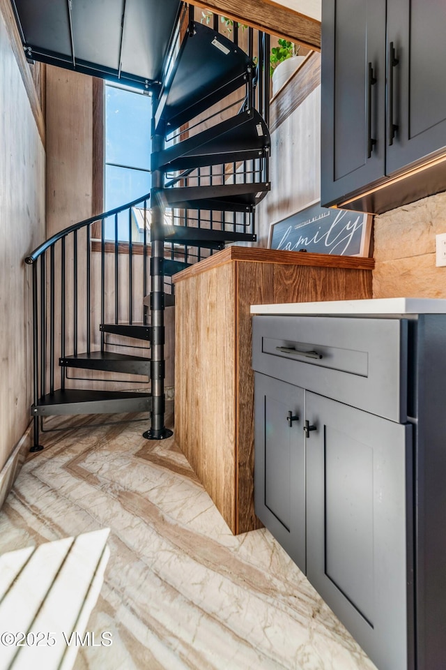329 River Frontage Rd Unit 18, Silt, CO 81652 - staircase featuring marble finish floor and floor to ceiling windows