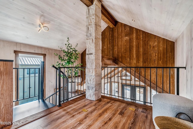 329 River Frontage Rd Unit 18, Silt, CO 81652 - interior space featuring vaulted ceiling with beams, hardwood / wood-style flooring, wooden ceiling, and an upstairs landing