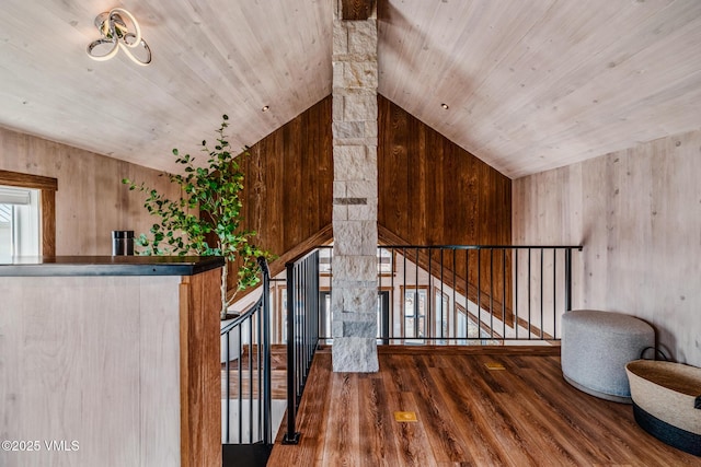 329 River Frontage Rd Unit 18, Silt, CO 81652 - staircase featuring vaulted ceiling, wood walls, wood finished floors, and wood ceiling
