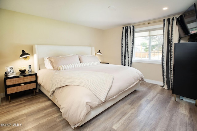 349 Whiting Rd, Eagle, CO 81631 - bedroom with light wood finished floors and recessed lighting