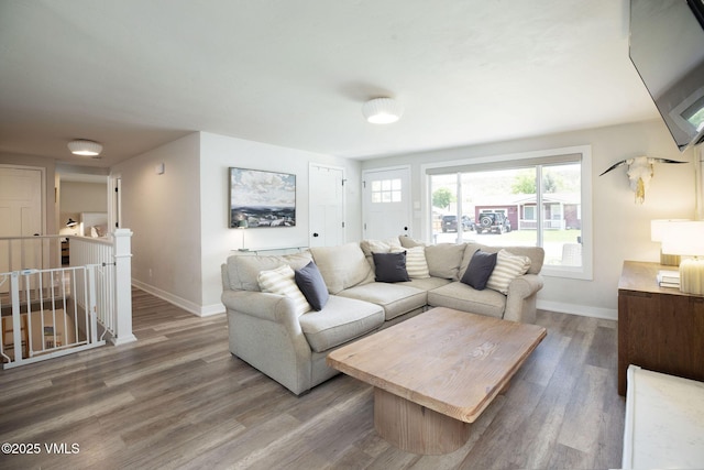349 Whiting Rd, Eagle, CO 81631 - living area with baseboards and wood finished floors