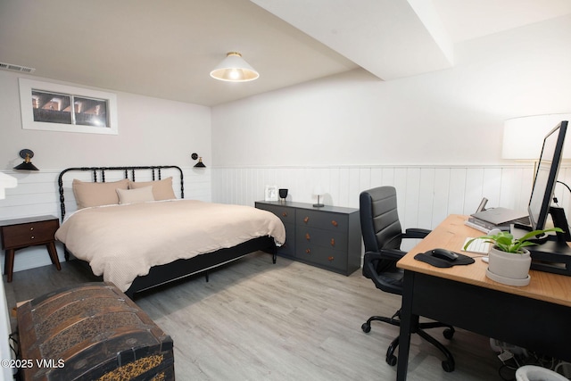 349 Whiting Rd, Eagle, CO 81631 - bedroom featuring wainscoting, light wood-type flooring, and an office area