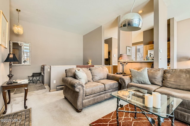 living area featuring a baseboard radiator and carpet