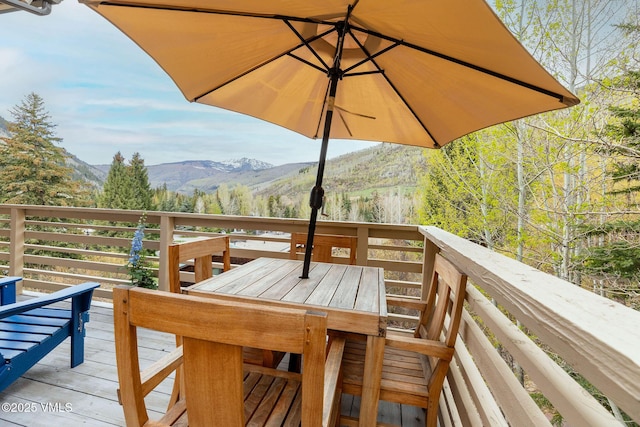 5024 Main Gore Dr S Unit 16, Vail, CO 81657 - wooden terrace featuring a mountain view and outdoor dining space
