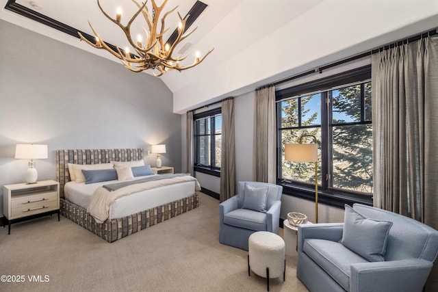 bedroom featuring a notable chandelier, carpet, and vaulted ceiling