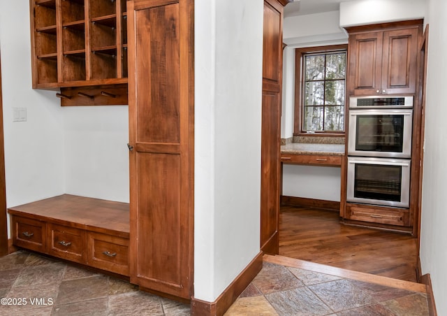 460 El Mirador Rd, Edwards, CO 81632 - mudroom with stone tile floors and baseboards