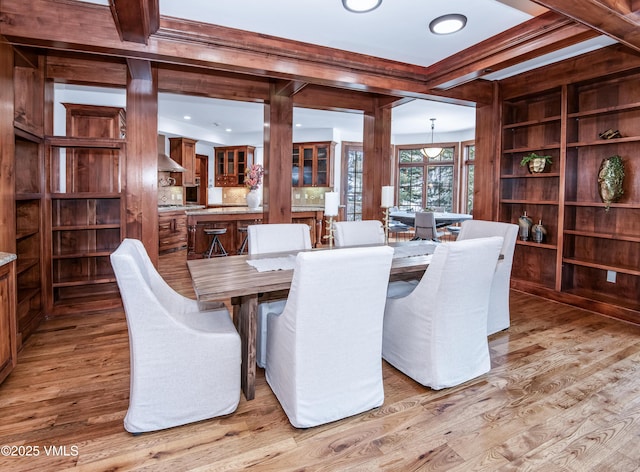 460 El Mirador Rd, Edwards, CO 81632 - dining area featuring light wood-style floors and ornamental molding
