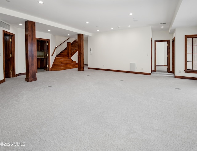 460 El Mirador Rd, Edwards, CO 81632 - unfurnished living room featuring baseboards, stairs, recessed lighting, and light carpet