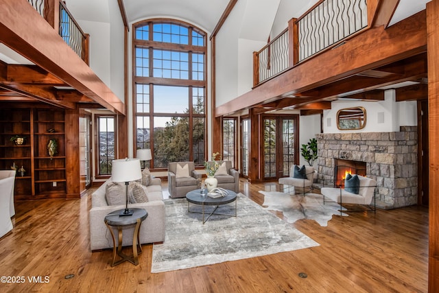 460 El Mirador Rd, Edwards, CO 81632 - living area with high vaulted ceiling, wood finished floors, and a fireplace