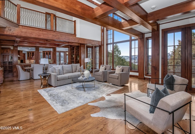 460 El Mirador Rd, Edwards, CO 81632 - living area featuring plenty of natural light, wood finished floors, beam ceiling, and coffered ceiling