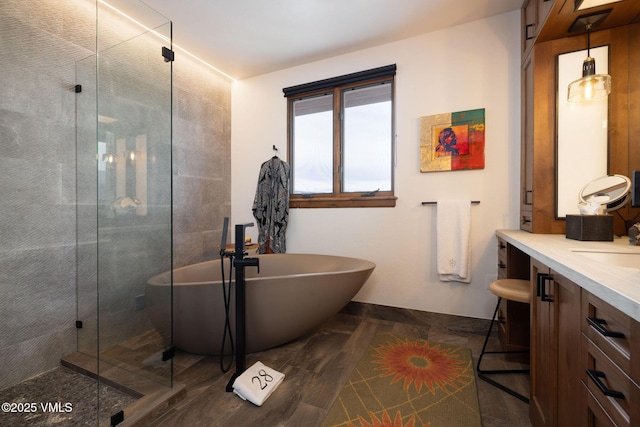 751 Singletree Rd Unit 28, Edwards, CO 81632 - full bath featuring vanity, a soaking tub, and a stall shower