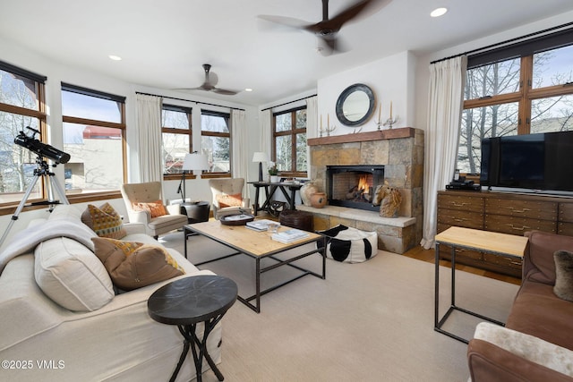 751 Singletree Rd Unit 28, Edwards, CO 81632 - living room with ceiling fan, a tiled fireplace, recessed lighting, and wood finished floors