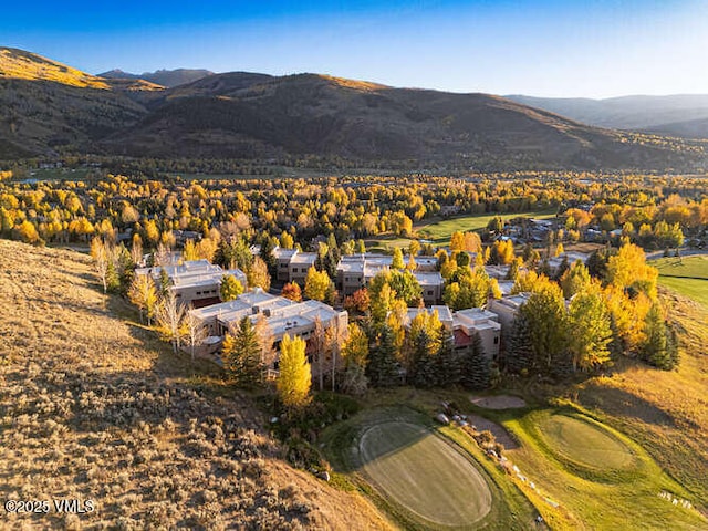 751 Singletree Rd Unit 28, Edwards, CO 81632 - view of mountain background featuring a local golf course and nearby suburban area