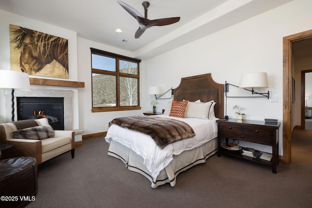 751 Singletree Rd Unit 28, Edwards, CO 81632 - carpeted bedroom featuring a high end fireplace, ceiling fan, and recessed lighting
