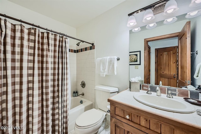 full bathroom with vanity, shower / bathtub combination with curtain, and toilet