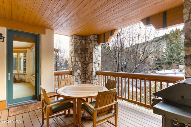 view of snow covered deck