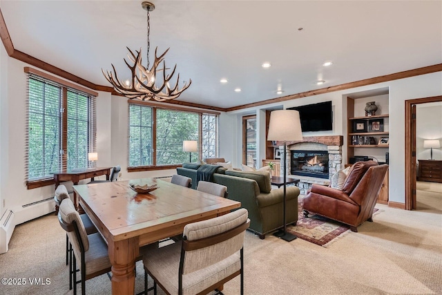 51 Offerson Rd Unit 202, Beaver Creek, CO 81620 - dining space featuring light carpet, a chandelier, a stone fireplace, recessed lighting, and ornamental molding