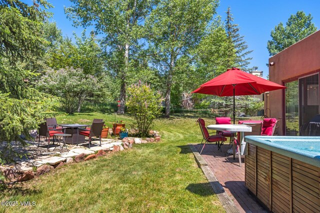 20 Hereford Rd, Edwards, CO 81632 - view of grassy yard with a fire pit, a patio area, and a hot tub