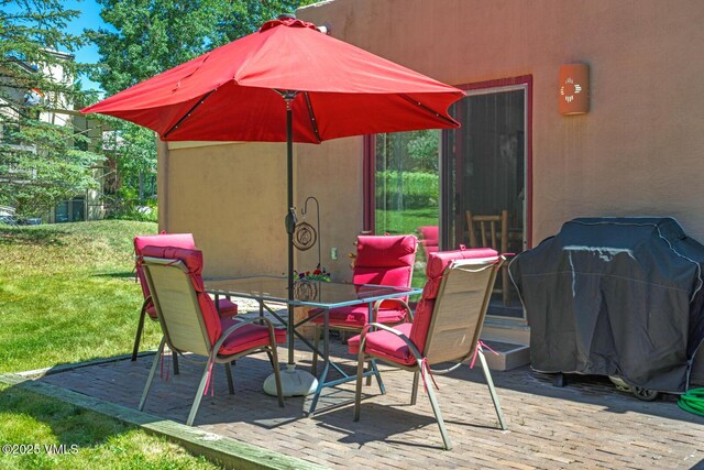 20 Hereford Rd, Edwards, CO 81632 - view of patio / terrace with outdoor dining area and a grill