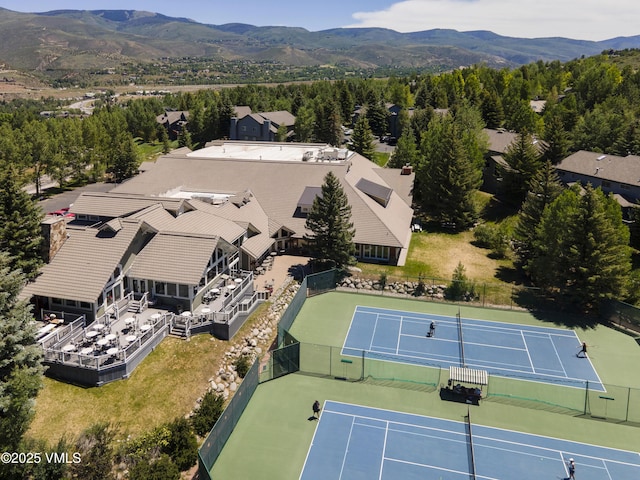 birds eye view of property featuring a mountain view