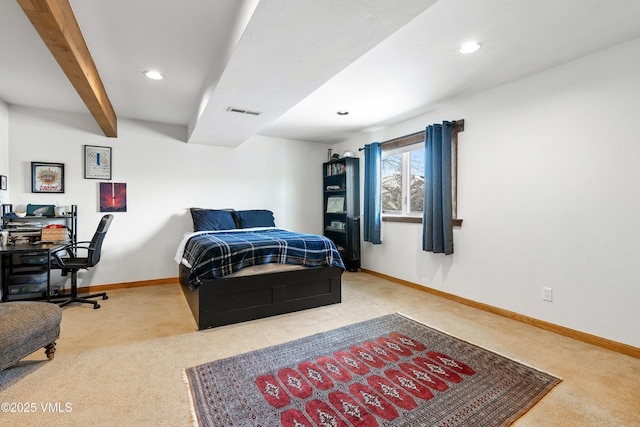 bedroom with baseboards, visible vents, beam ceiling, and carpet flooring