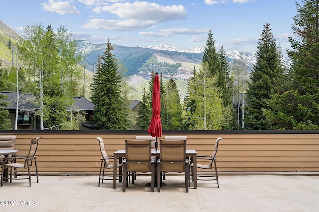 1650 Fallridge Rd Unit 120, Vail, CO 81657 - view of patio featuring a mountain view and outdoor dining space