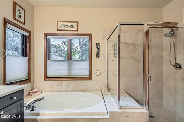 803 June Creek Rd, Edwards, CO 81632 - full bath featuring a bath, a stall shower, and vanity