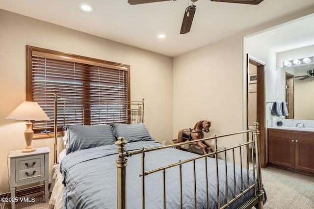 803 June Creek Rd, Edwards, CO 81632 - bedroom with light colored carpet, connected bathroom, a sink, recessed lighting, and ceiling fan