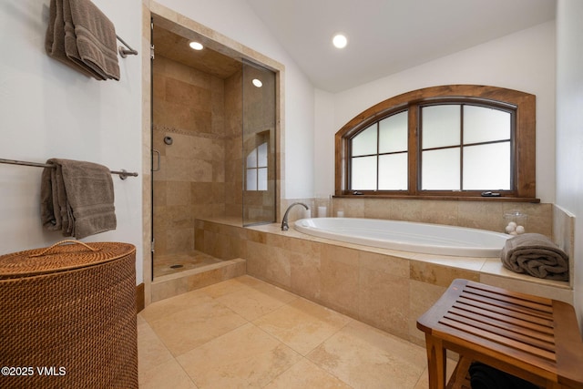 80 Mountain Retreat Ct, Edwards, CO 81632 - bathroom featuring tiled shower, a garden tub, recessed lighting, lofted ceiling, and tile patterned flooring