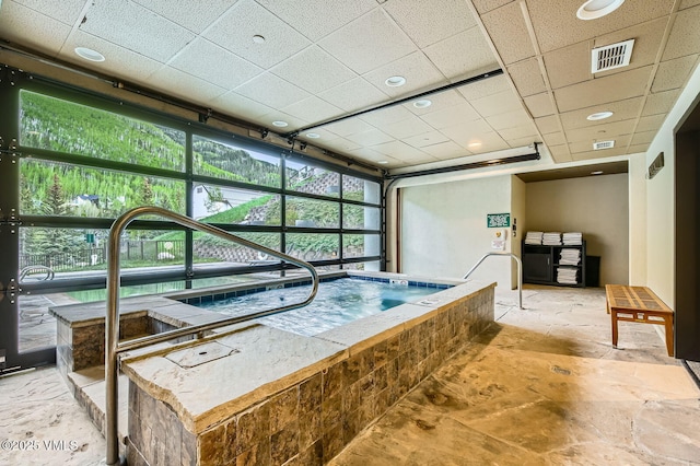 1234 Westhaven Cir Unit A-71, Vail, CO 81657 - misc room featuring stone finish flooring and a drop ceiling