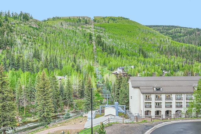 1234 Westhaven Cir Unit A-71, Vail, CO 81657 - view of mountain backdrop with a heavily wooded area