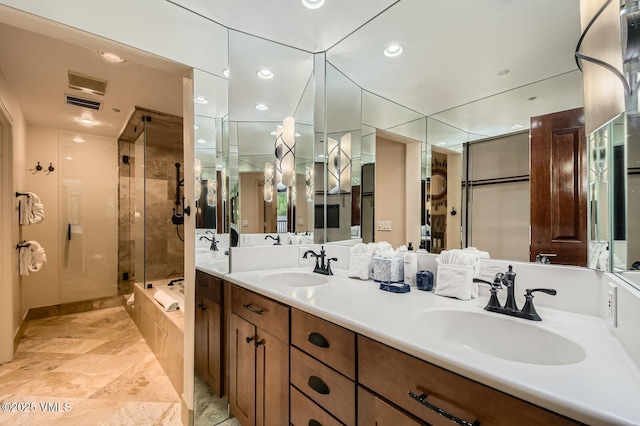 1234 Westhaven Cir Unit A-71, Vail, CO 81657 - full bathroom featuring a stall shower, double vanity, a bath, and recessed lighting