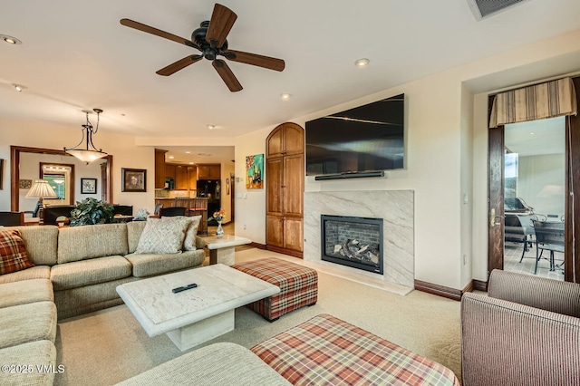 1234 Westhaven Cir Unit A-71, Vail, CO 81657 - living room featuring light carpet, a high end fireplace, ceiling fan, recessed lighting, and baseboards