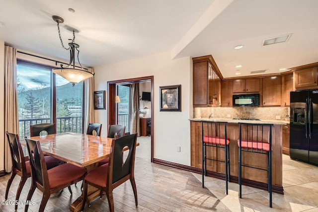 1234 Westhaven Cir Unit A-71, Vail, CO 81657 - dining space featuring light wood finished floors and recessed lighting