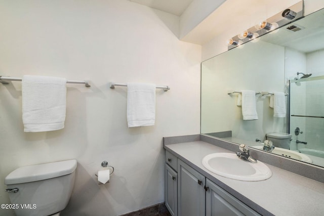 210 June Creek Rd Unit A, Edwards, CO 81632 - bathroom featuring toilet, vanity, and shower / washtub combination