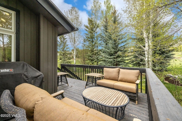 210 June Creek Rd Unit A, Edwards, CO 81632 - wooden deck with an outdoor living space and area for grilling