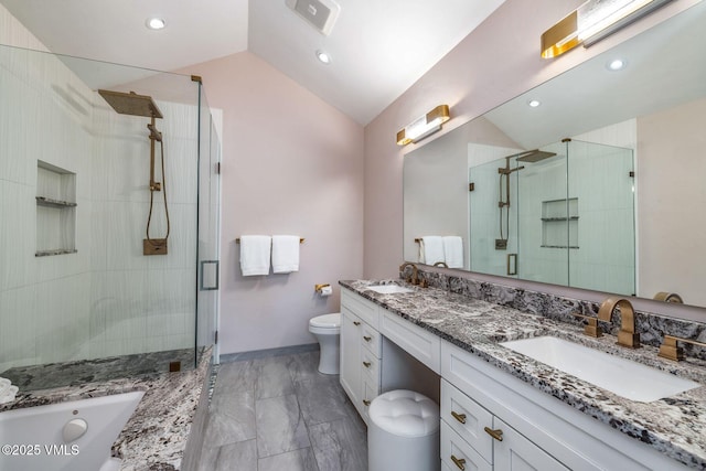210 June Creek Rd Unit A, Edwards, CO 81632 - full bathroom with double vanity, a stall shower, lofted ceiling, marble look tile flooring, and toilet