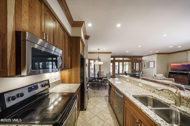 660 Lionshead Pl Unit 9, Vail, CO 81657 - kitchen with appliances with stainless steel finishes, a sink, ornamental molding, light tile patterned floors, and light stone countertops