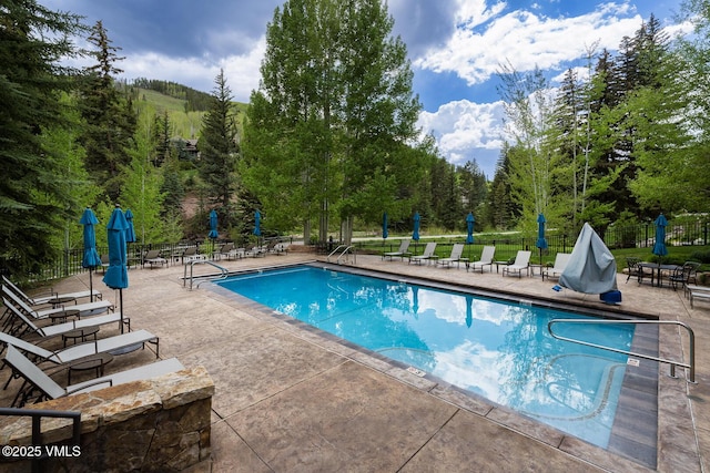 660 Lionshead Pl Unit 9, Vail, CO 81657 - community pool featuring a patio area